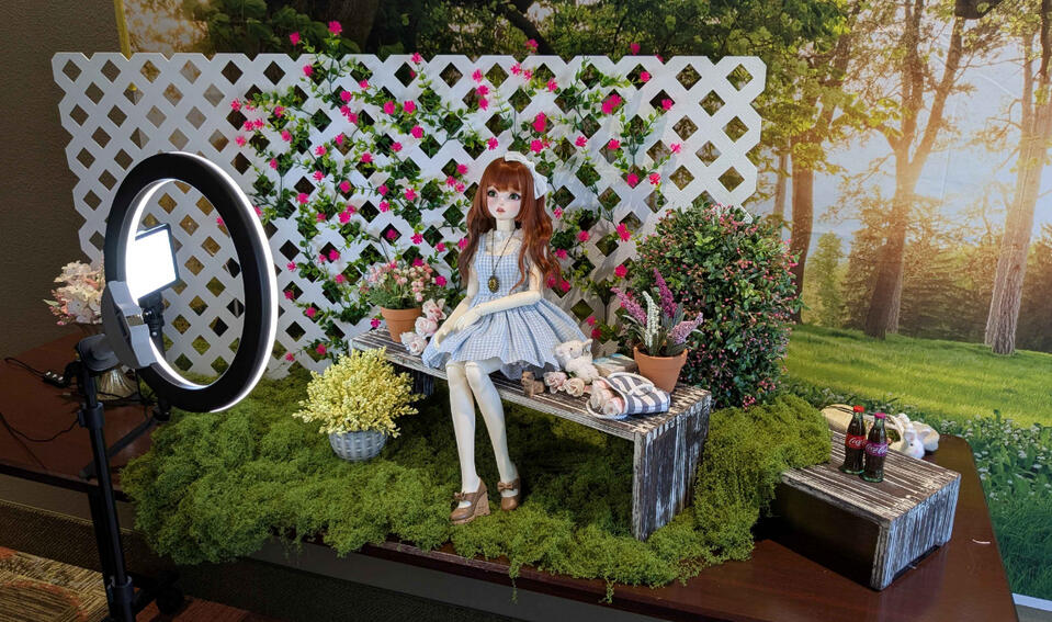 photograph of a photo space with a doll in it